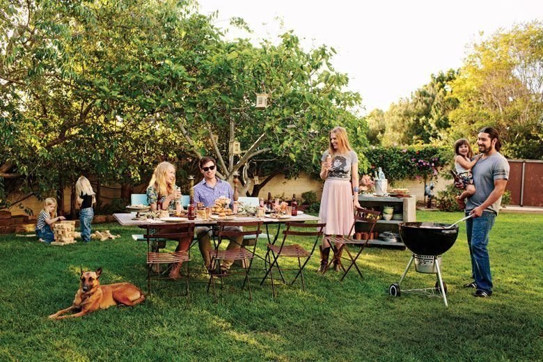 Guests enjoying an outdoor backyard party catered by WSG Services